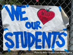 Close up shot of handmade sign  from a teacher missing their students during lockdown 0Pjrl4