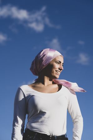 Young woman with cancer bandana