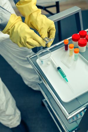 Doctor preparing medication for a patient