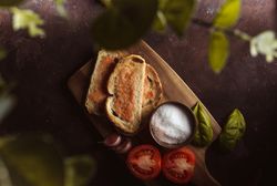 Spices and vegetables near toasts