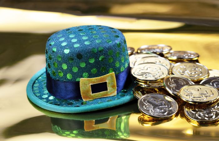Saint Patrick background with green hat and gold coins