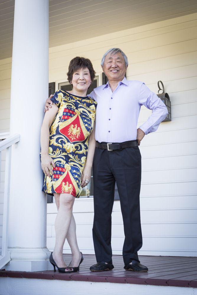 Proud Chinese Couple Enjoying Their House