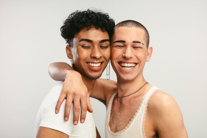 Young couple in love on a light background