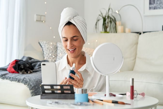 Woman blogger telling followers in social media about cosmetic s