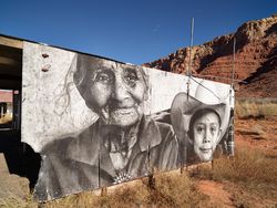 Outdoor mural photograph of older Navajo woman and boy by Chip Thomas R0JKp5