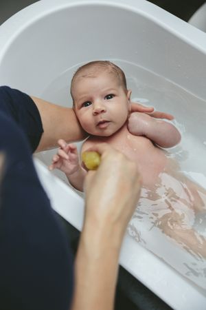 Newborn in the bathtub