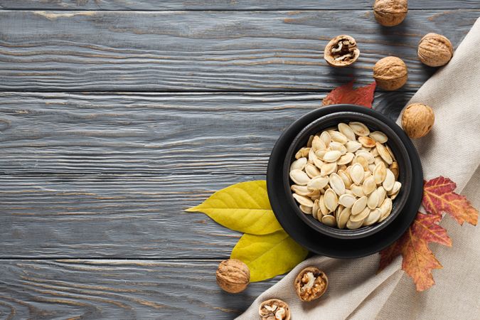 Cooking ingredients for fall season - pumpkin seeds, pumpkin