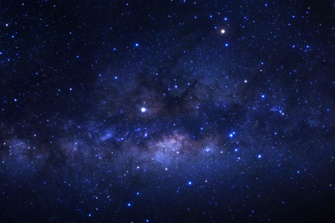 The center of the milky way galaxy with stars and space dust in the universe, Long exposure photograph, with grain