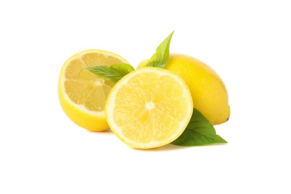 Fresh lemons isolated on bright background. Ripe fruit