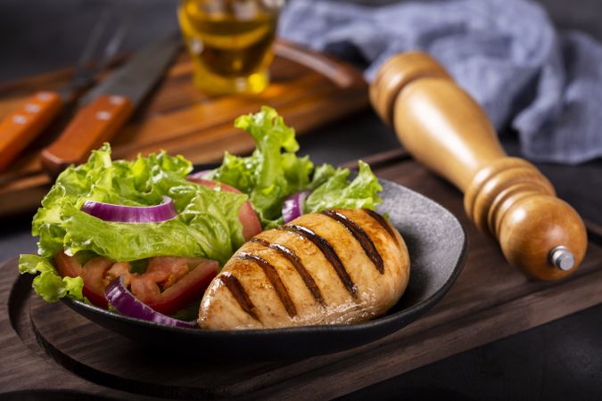 Tasty grilled chicken with salad.