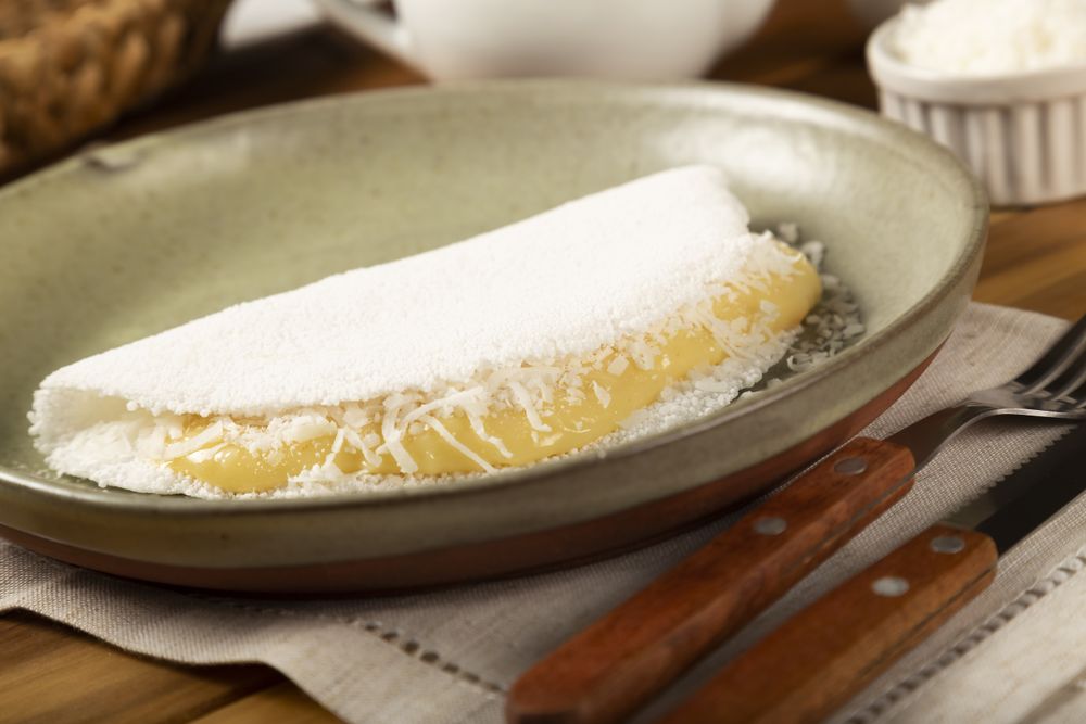 Sweet tapioca stuffed with coconut cream. Brazilian tapioca.