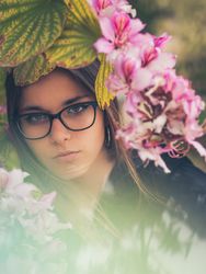 Woman on background of stunning violet flowers