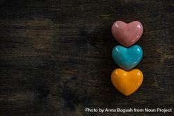 Valentine's day concept with three colorful ceramic heart 0v33qL