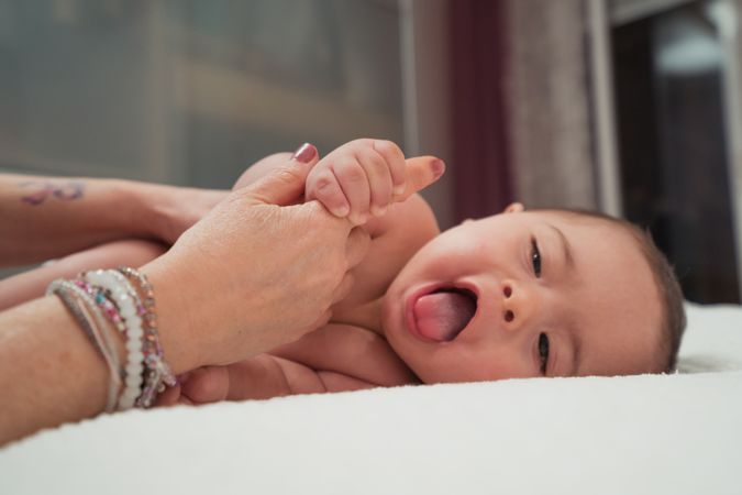 Portrait of cute baby boy with Down syndrome