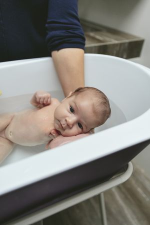 Newborn in the bathtub
