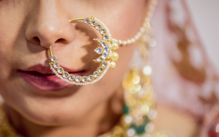 Close-up shot of bride in traditional Indian jewelry