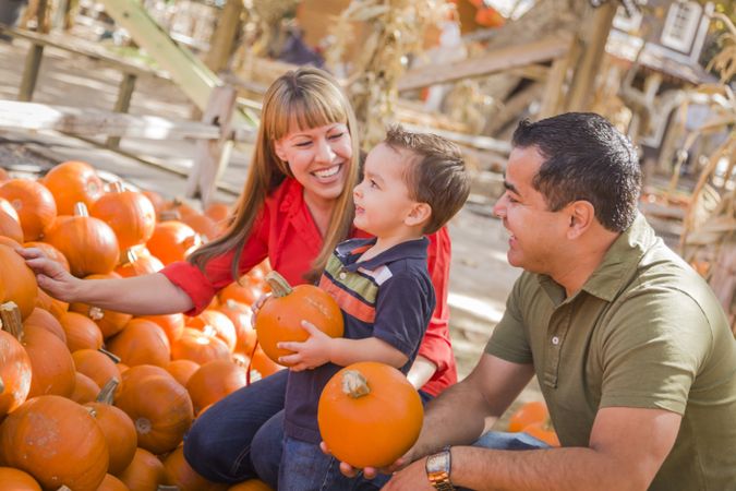 Happy Family at the Pumpkin Patch