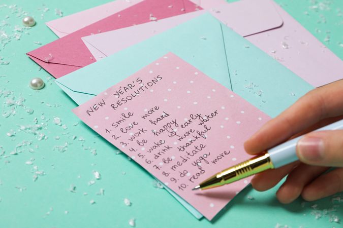 Concept of New Year Resolutions list, new year goals, close up