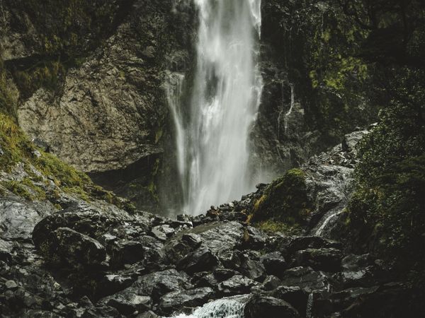 Moody and Dark Waterfall Cliffside Landscape