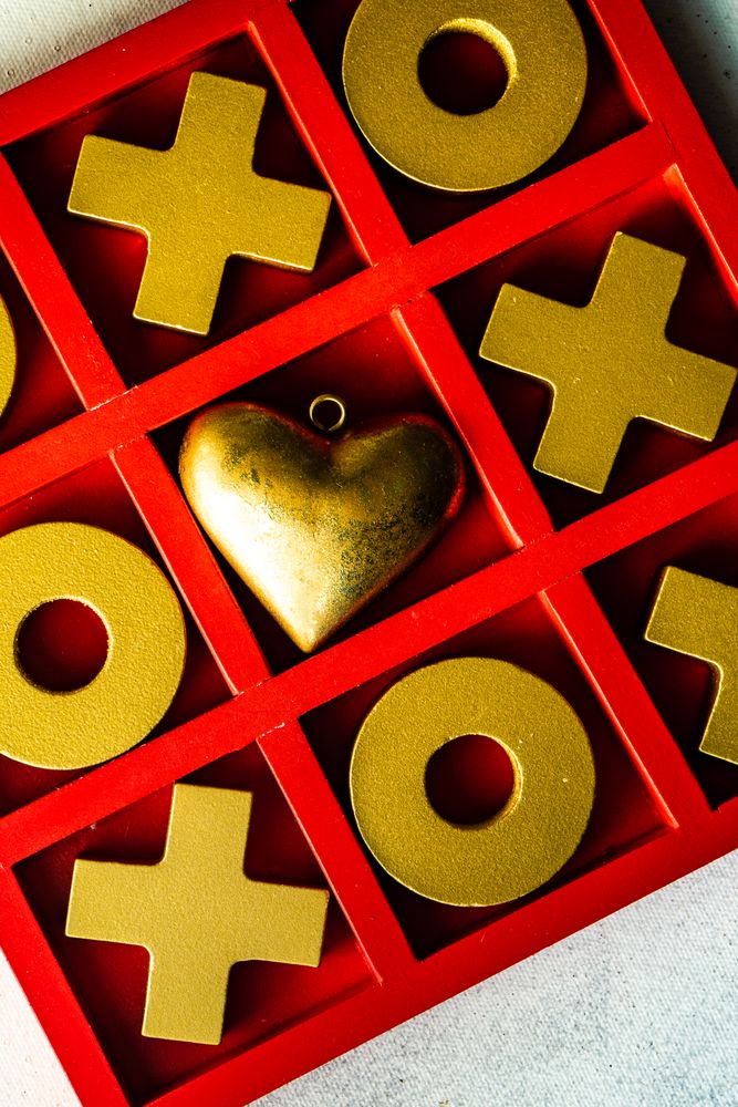 St. Valentine day card with tac-tac-toe and heart