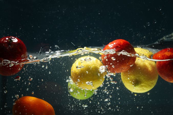 Side view of whole fruits in water