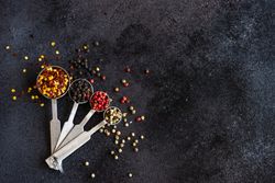 Measuring spoons filled with seasonings