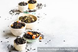 Tea varieties on stone background with space for text 47Q1z0