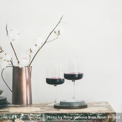 Wine glasses with dried cotton in vase, square crop, copy space 4NYo85