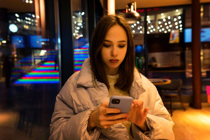Woman enjoying nightlife in city