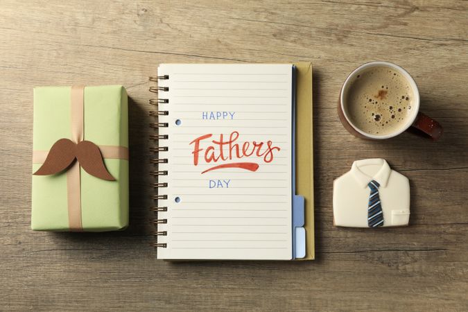 Happy father's day inscription, inscription in notebook, with gifts.