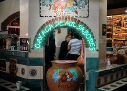 Sign in entrance of restaurant in Oaxaca