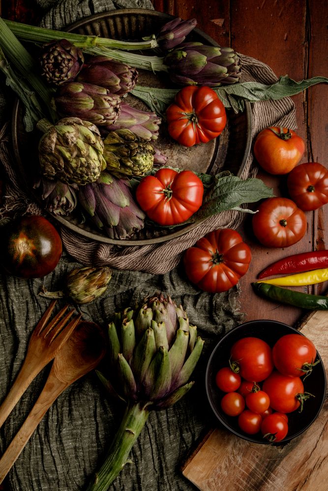 Assorted vegetables and napkins on table
