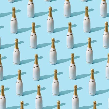 Champagne bottle in rows