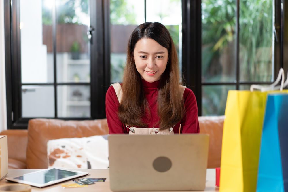 Female working at online e-commerce store
