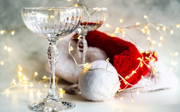 Champagne glass and Christmas Santa hat