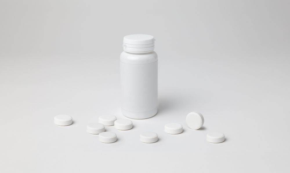 Mockup of a closed aspirin bottle, plastic material