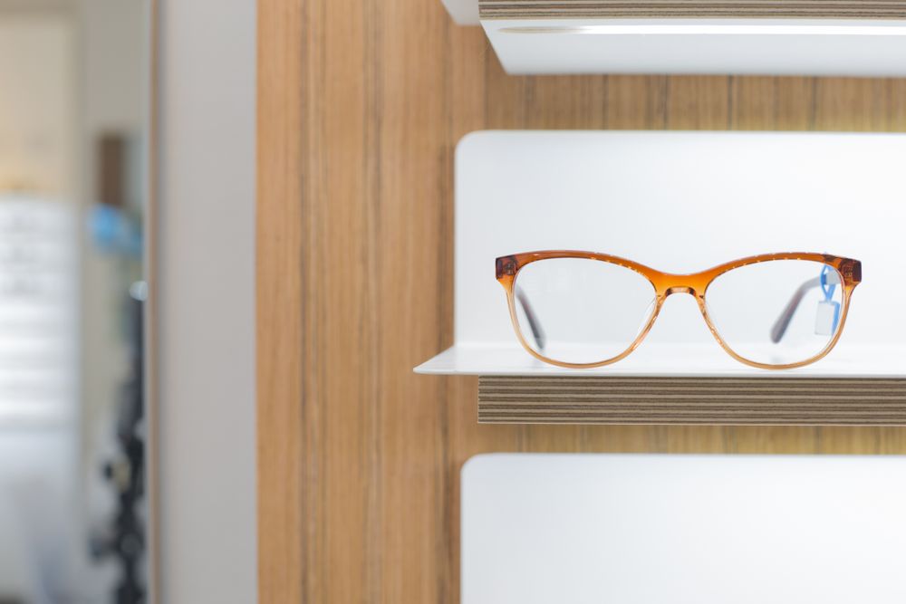 glasses on a shelf in a store