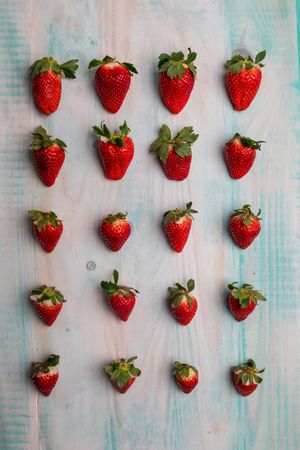 Set of fresh strawberries on desk