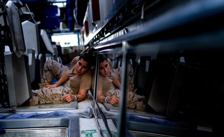 Military woman inside modern vehicle