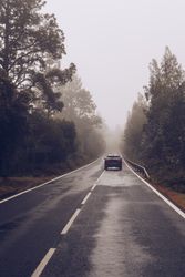 Car on road in overcast day