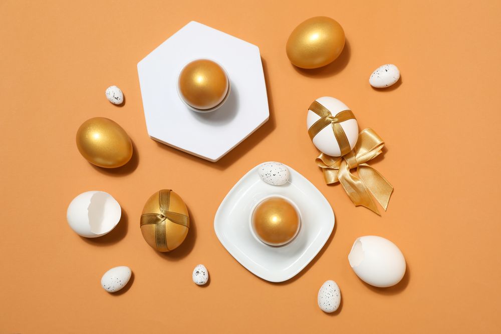 Concept of Richness, golden eggs, top view