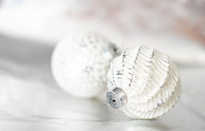 Christmas holiday baubles on light background
