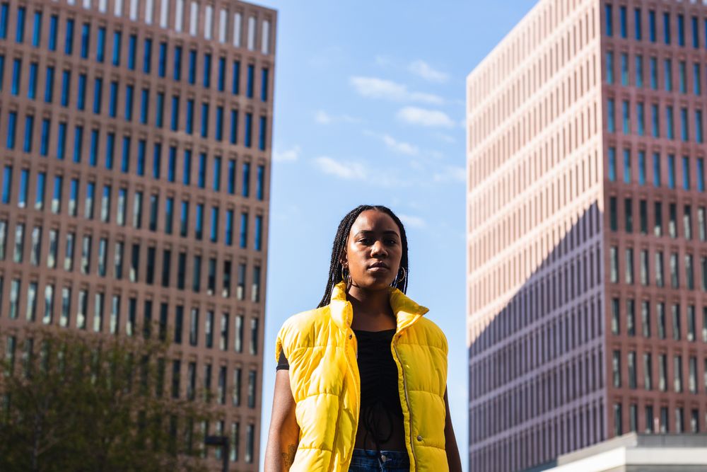 Trendy Black woman on city street