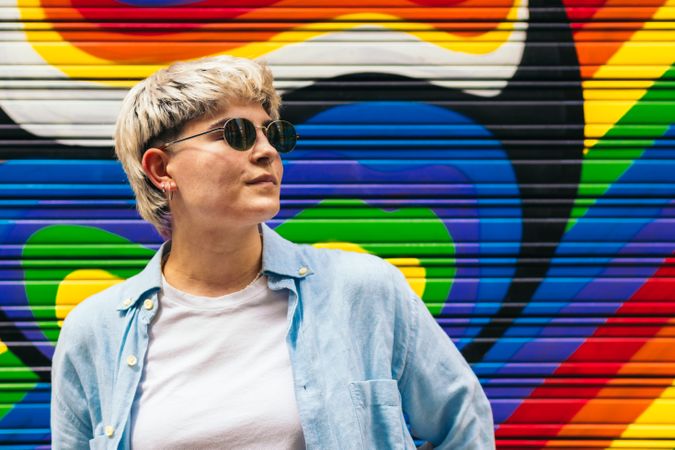 stylish young woman portrait on a colorful background