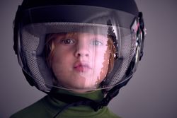 Little boy in protective mask in studio