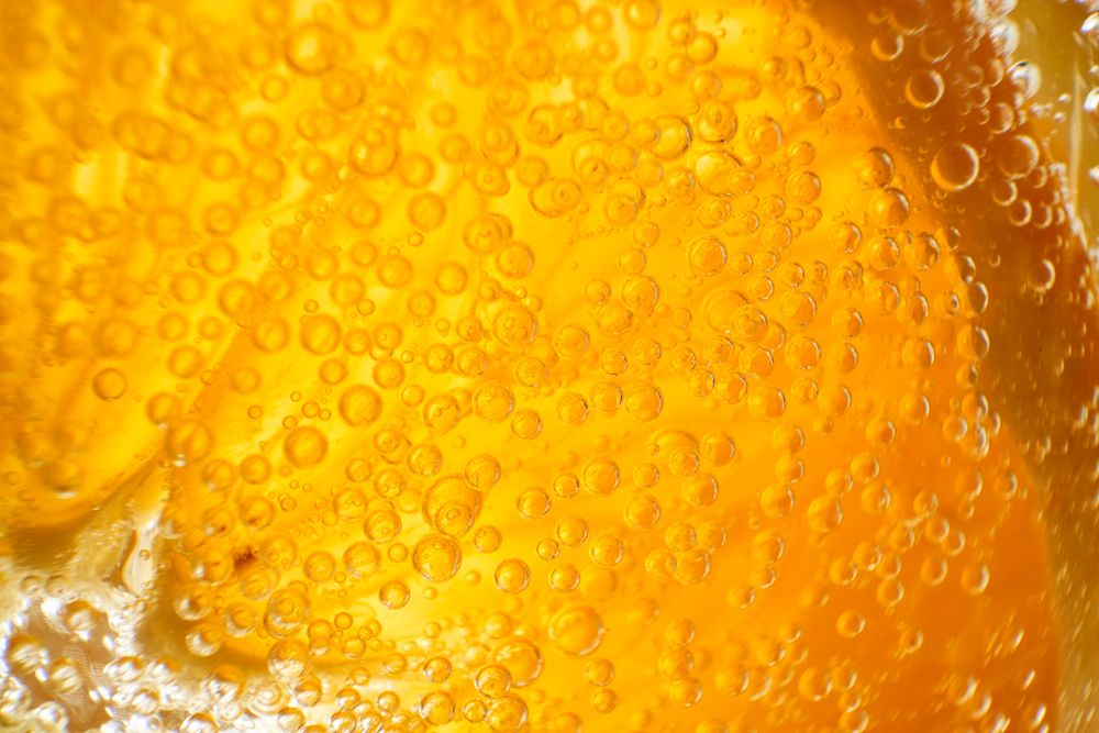 Orange in tasty alcoholic beverage
