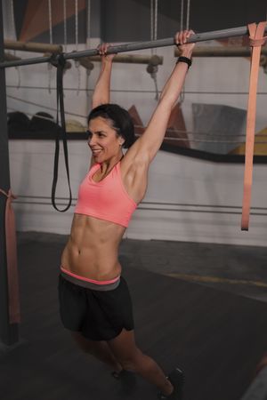 Athletic woman training in gym