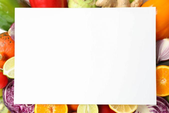 Vegetables, fruits and empty space on plain background, top view