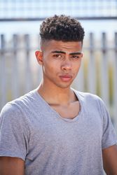 Portrait of serious man looking at camera
