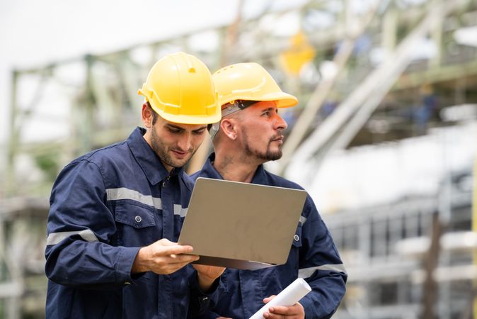 Engineer worker checking project at petrochemical factory or refinery oil plant industrial.